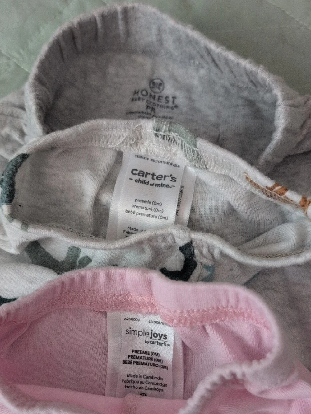 Lot Of 7 Preemie Baby Sleepers & Pants - Carter's, Gerber, & Honest.